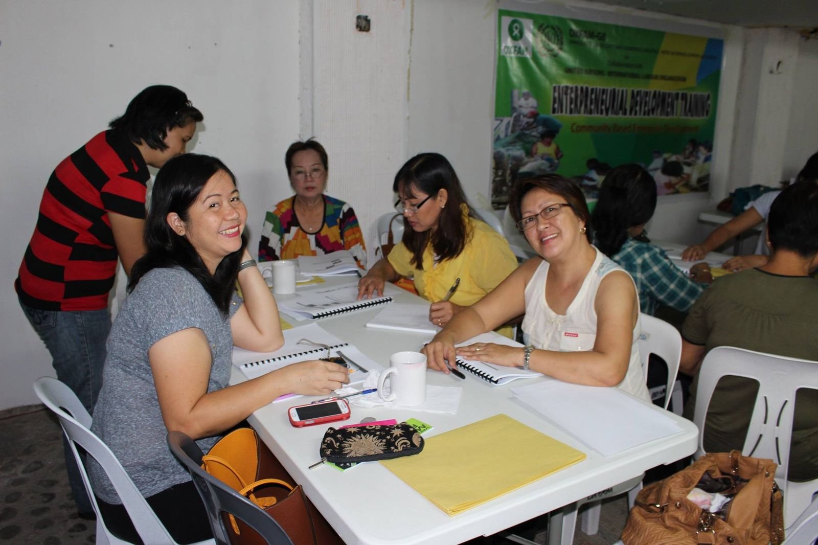 A community-based enterprise development training session in progress